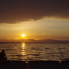 夕日と釣り人