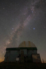 Corona observatory with shooting star