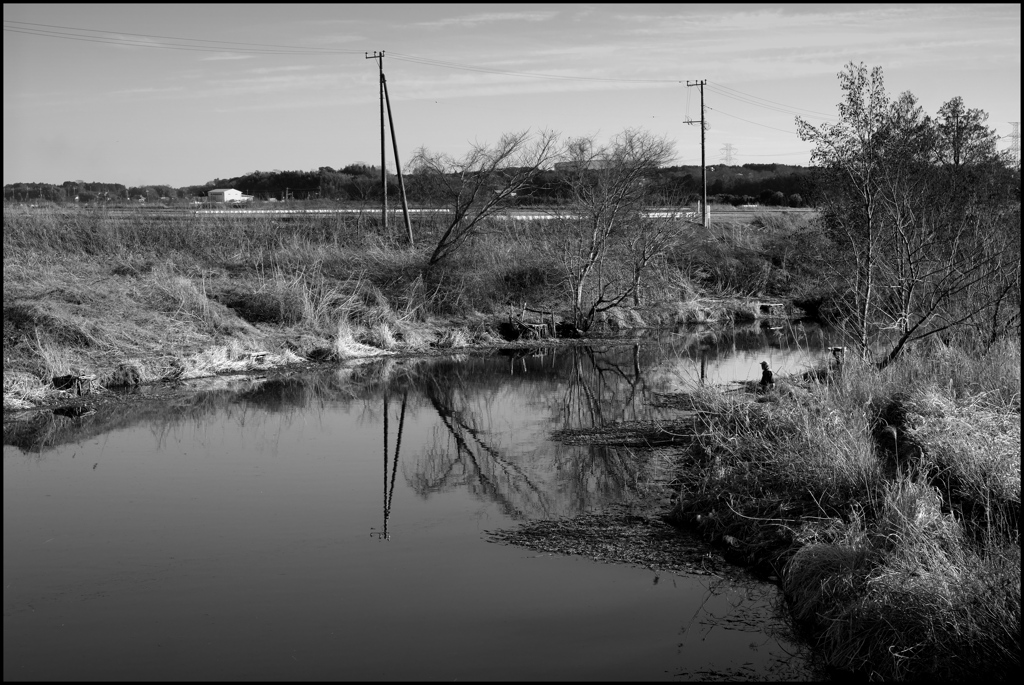 立春、釣りをする人