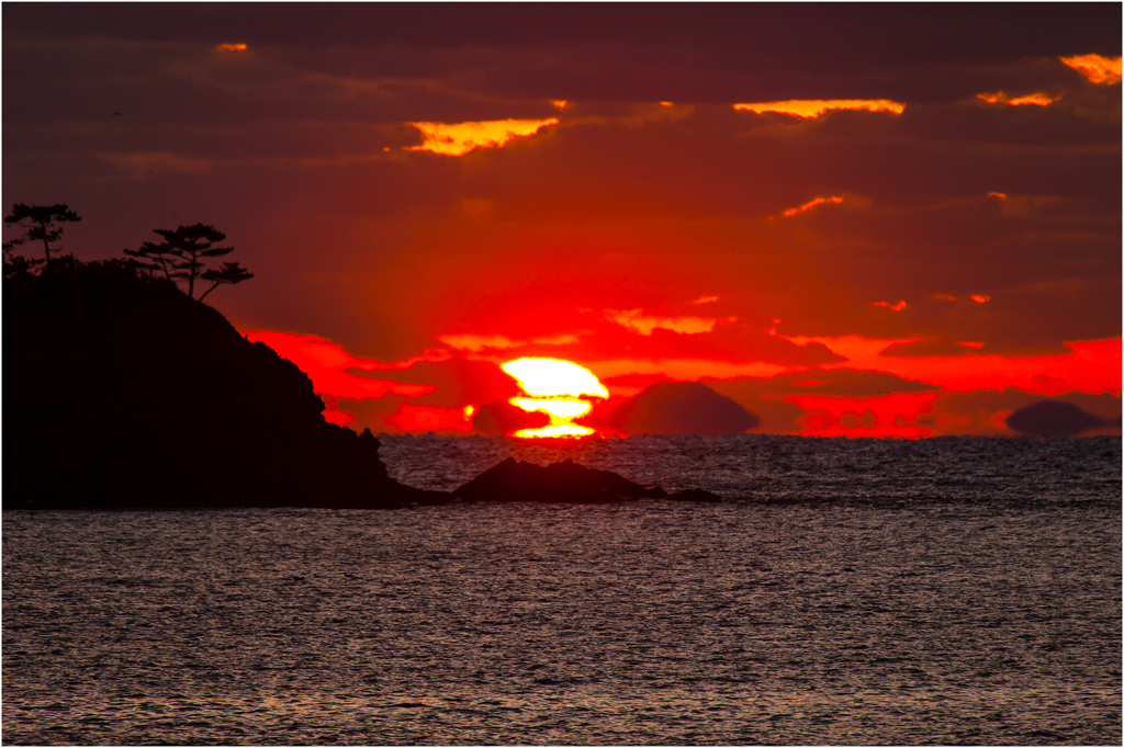 砕ける夕陽