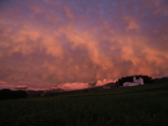 南アルプスの上空の夕焼け
