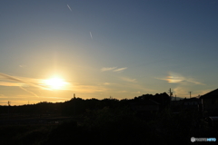 落日と彩雲