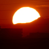 荒川遊園後ろの鶏冠山左の夕日