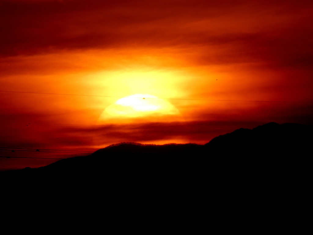 七つ石山辺りに沈む夕日
