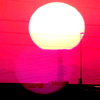 '22.05.18.18:33.丸山の奥に雲があるらしい夕日