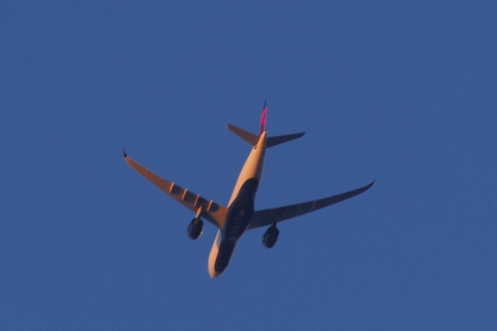 夕日当たる荒川上空