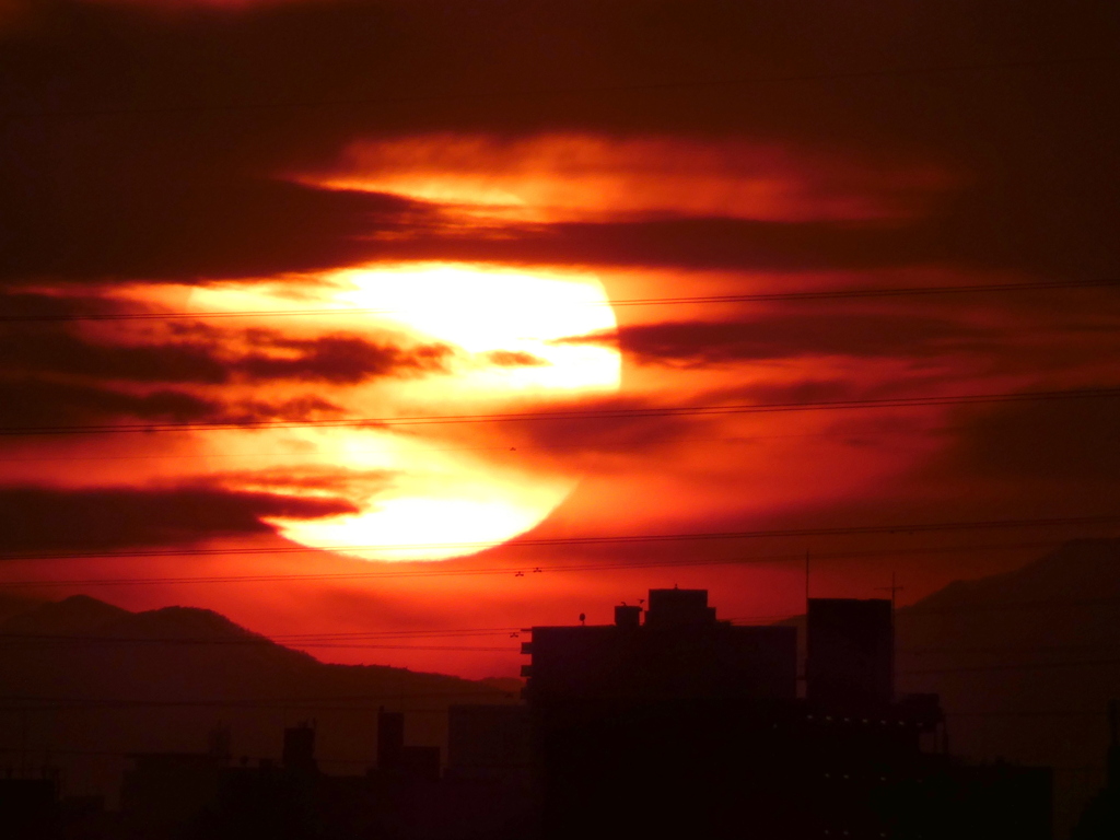 '22.02.28.17:30.の夕日左隅 東岳～徳右衛門岳,蝙蝠岳
