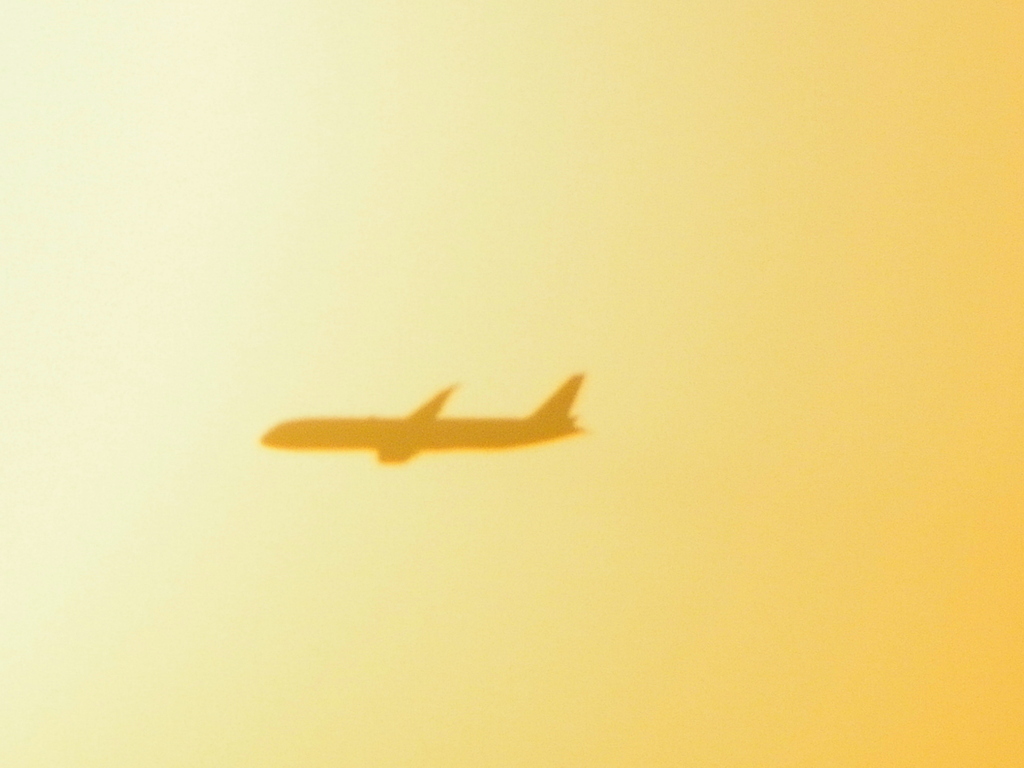 夕日と飛行機