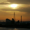 隅田川の尾竹橋からの雲被る夕日