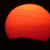 '22.5.5.の隅田川の雲も中に落ちる大きな夕日