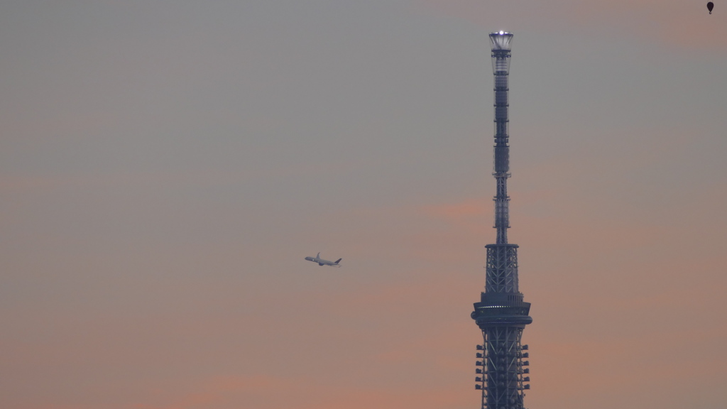 夕焼けのはるか遠くから