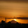 扇大橋から荒川遊園の観覧車と富士裾の上の夕日