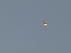 航空機の夕日反射