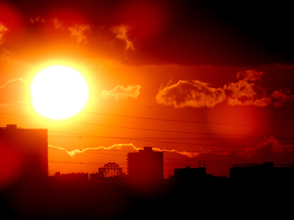 荒川土手から荒川遊園の見える夕日