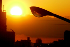 千住土手下中通りの夕日