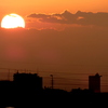 千住新橋から雲の夕日と笠山が見える夕景