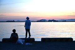 夏の釣り人