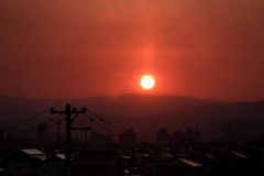 The sunrise rises in my town.
