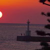夕日と灯台