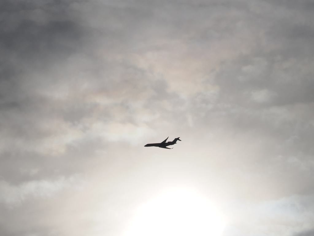 渋谷上空の旅客機