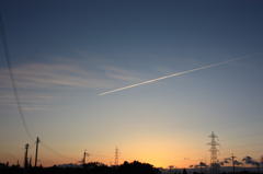 夕日のひこうき雲