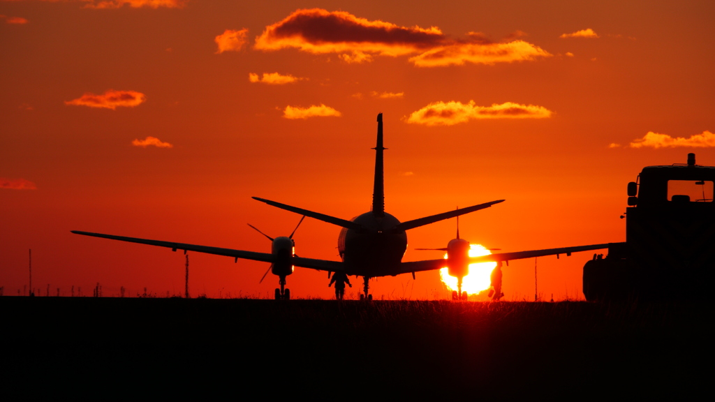 Airplane in the sunset