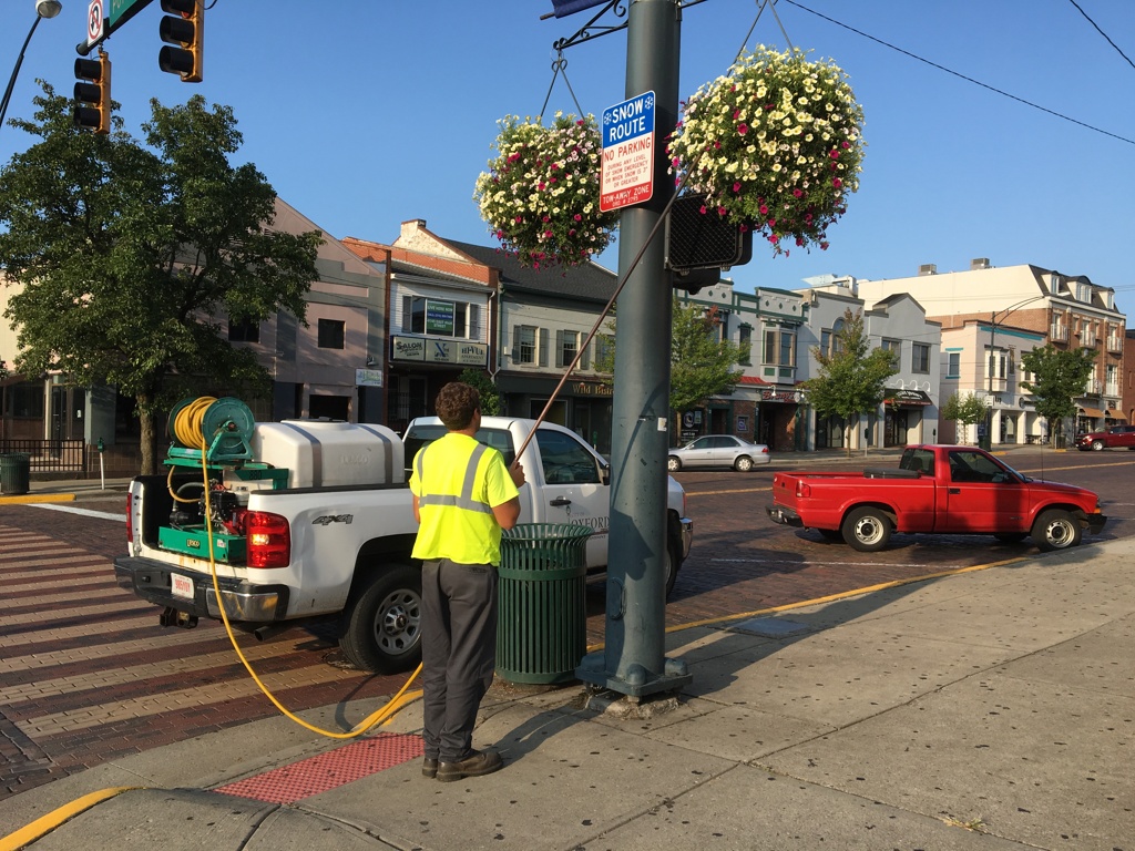 Watering Street Flowers in OH