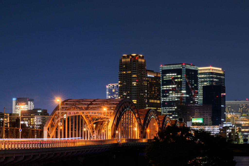 Bridge and buildings at night