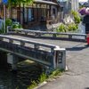 Woman standing on a bridge