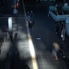 走る人