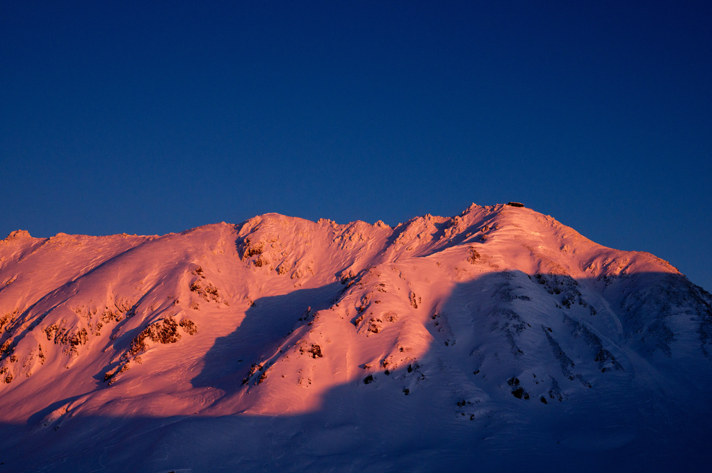 夕日に染まる立山