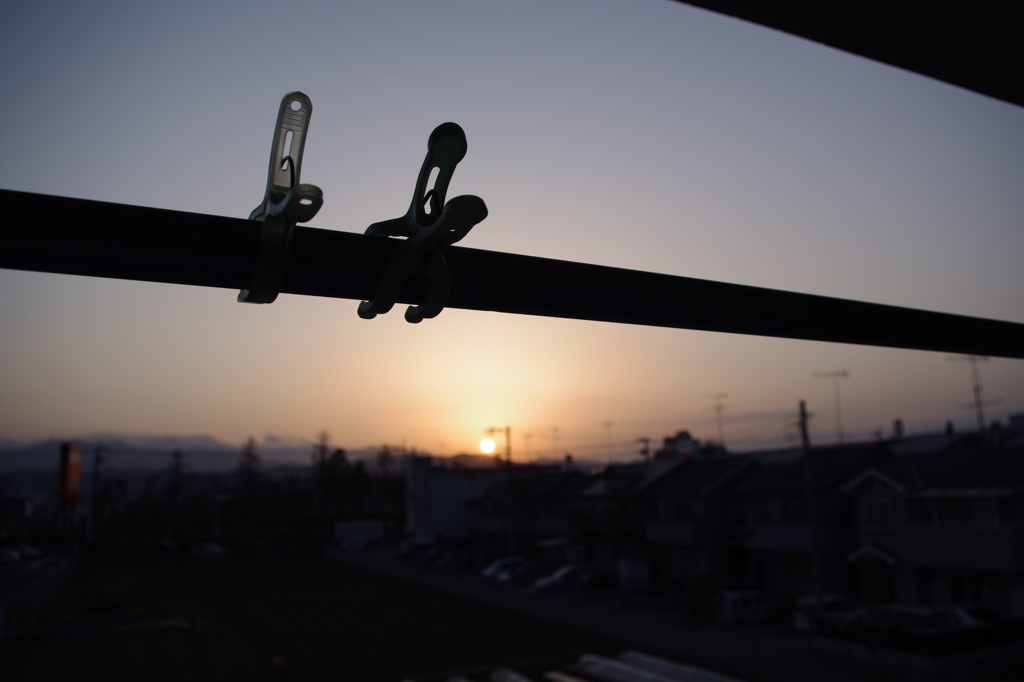 夕日・洗濯・物干し竿