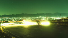 ヘッドライトと夜景