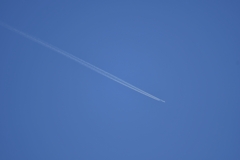 Contrail in the blue sky