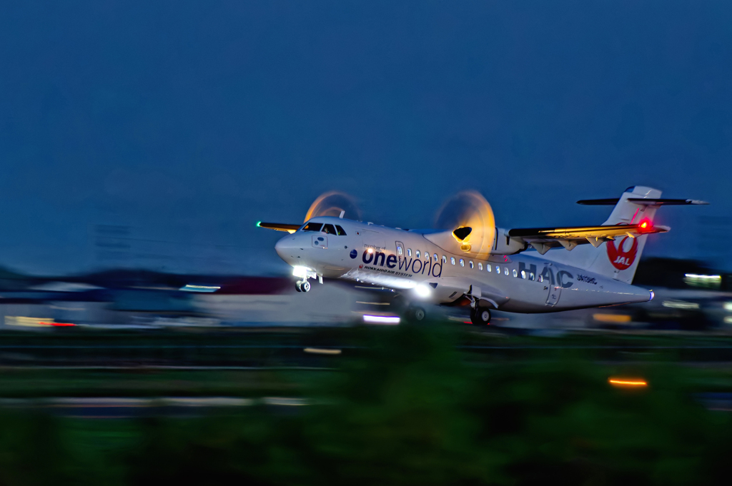 HAC oneworld/Departure after sunset