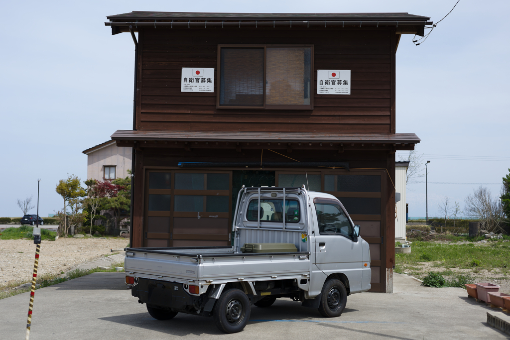 日の丸と軽トラ