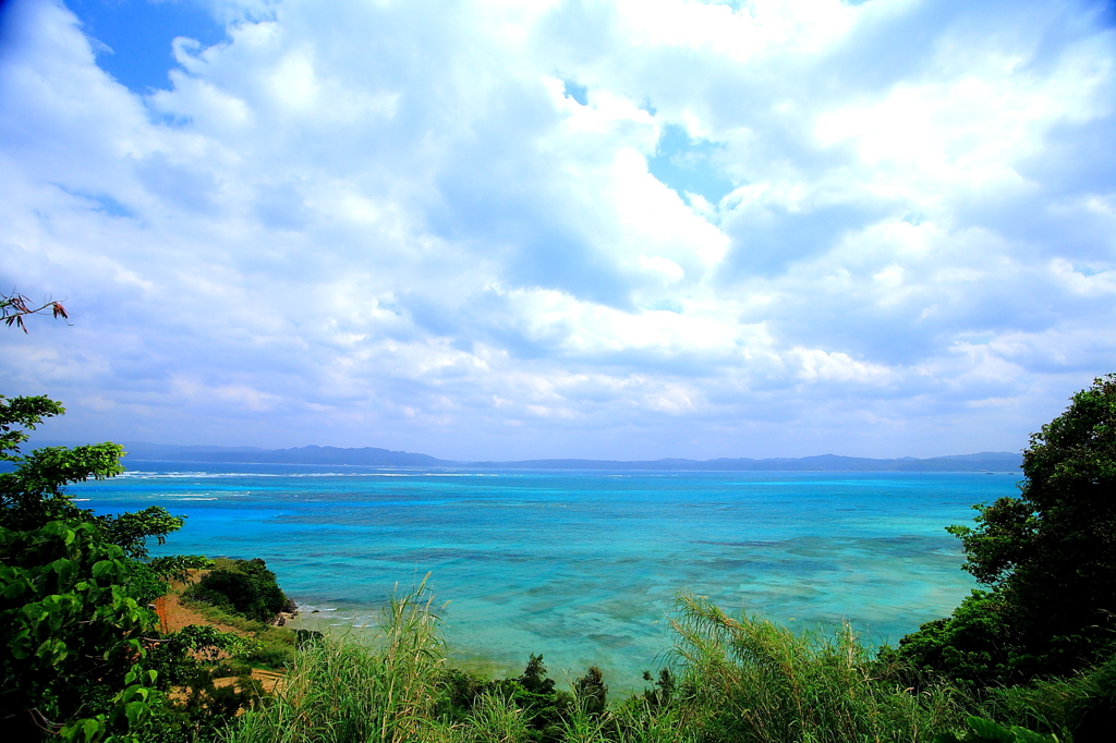 serene skies and a bright blue sea