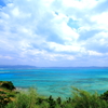 serene skies and a bright blue sea