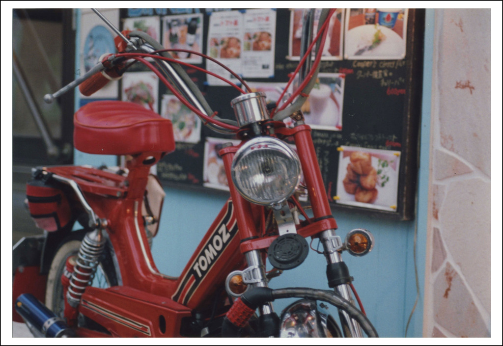 TOMOS