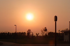 秋空の夕日