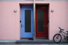 colorful doors, wall, and bicycle