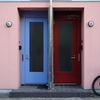 colorful doors, wall, and bicycle