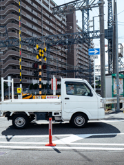 踏切にて