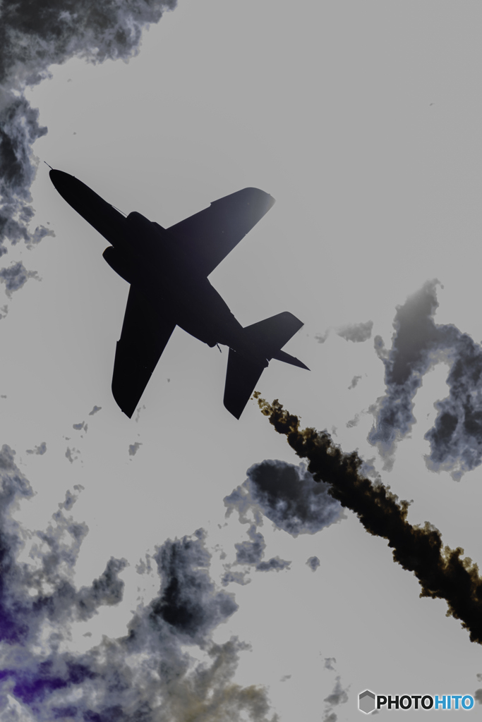 太陽を背景にして