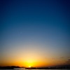 飛行機雲と夕焼け