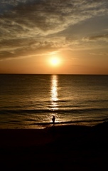朝焼けと釣り人