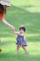 She is standing on lawn