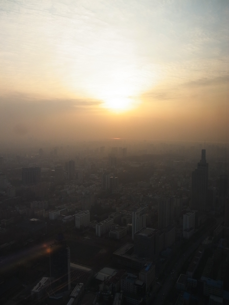 沈む夕日と南京