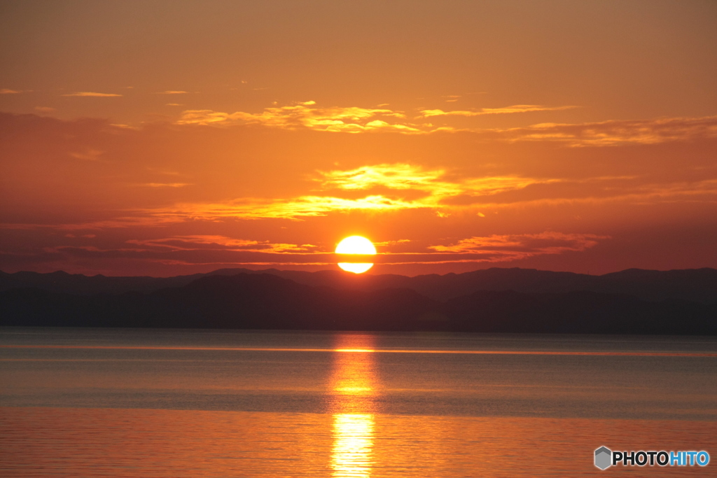 夕陽に止せて