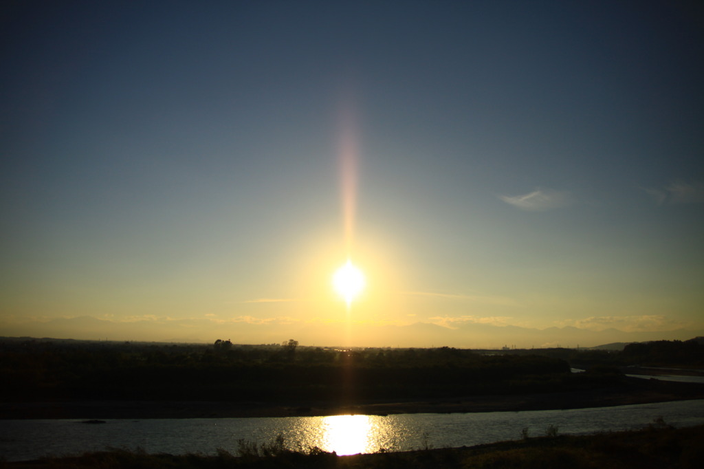 十勝川に映る夕日
